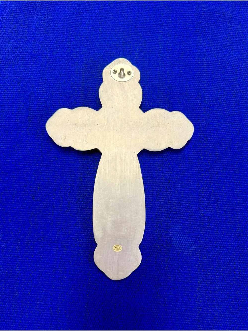 Silver-Colored Metal Cross with Sapphire Blue Centerpiece